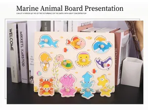 Macro detail of wooden sea animal puzzle board with round knobs for toddler learning