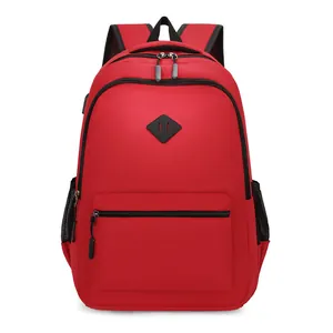 Red large capacity travel backpack with dual zippers and side mesh pockets on white background