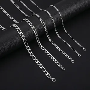 Detail showing five different widths of silver Figaro chains with lobster clasps