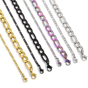 Macro shot of stainless steel Figaro and Curb chains in gold, black, silver and rainbow