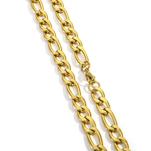 Macro shot of 18K gold plated Figaro link chain with lobster clasp and high polish finish