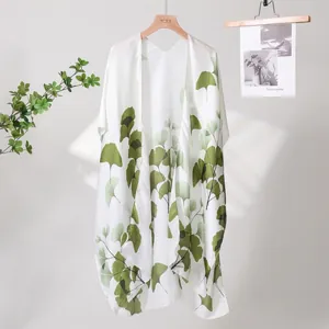Elegant white satin sun protection shawl with green ginkgo leaf patterns for women
