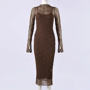Detail view of coffee lace midi dress featuring intricate patterns and high neck