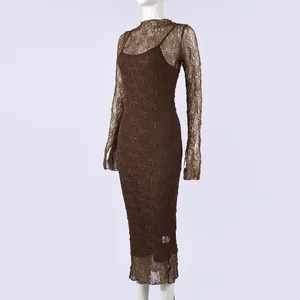 Detailed macro of dark brown lace long sleeve dress with floral crochet texture