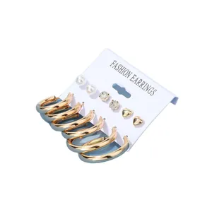 Set of 6 pairs of fashion earrings with gold hoops, pearls, crystals and hearts