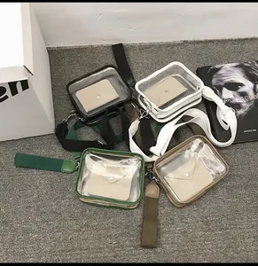Overhead view showing transparent PVC handbags with inner pouches and fabric straps