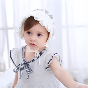 Detailed lace texture and ruffle brim on baby white princess bonnet for girls