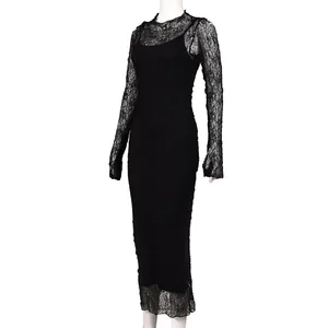 Detailed view of sheer black lace fabric and intricate floral patterns on a long sleeve dress