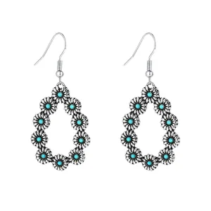 Vintage silver finish boho dangle earrings with turquoise stones in a floral teardrop shape