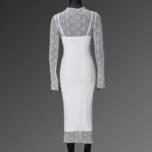 Detailed back view of white lace maxi dress showing intricate floral mesh texture