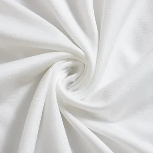 Close-up of white sheer lace fabric texture with fine mesh pattern and soft gloss