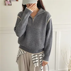 Gray long-sleeve knit sweater with half-zip polo neck and white contrast piping trim