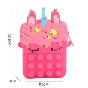 Pink unicorn pop-it purse dimensions showing height 13.5cm width 8.5cm and thickness 4cm