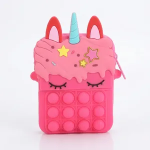 Pink unicorn pop-it purse dimensions showing height 13.5cm width 8.5cm and thickness 4cm