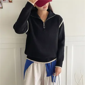 Women's half-zip knit sweater in black with contrast scalloped crochet trim edges