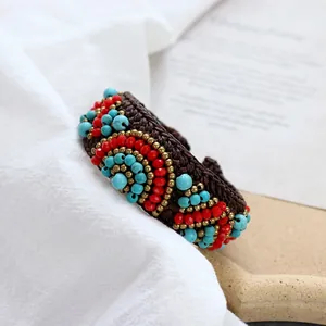 Handmade Bohemian braided bracelet with natural red stones and turquoise beads