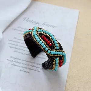 Handmade Bohemian woven bracelet with colorful beads and natural stones for women