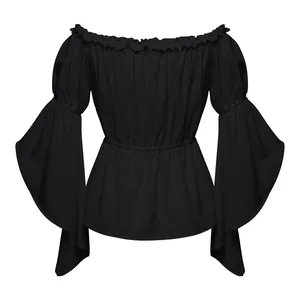 Detail of off-shoulder black top with ruffled neckline and wide flared sleeves