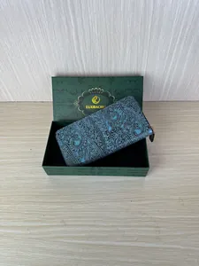 Blue and black paisley embossed long wallet presented in a luxury green gift box