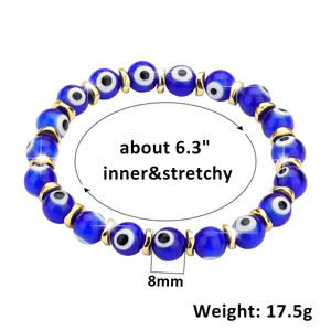 Detail view of 8mm blue evil eye beads and golden spacers with size specifications