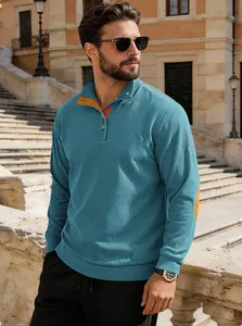 Polo homme en velours côtelé bleu avec empiècements coudes orange et col boutonné
