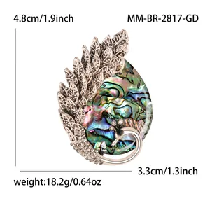 Vintage silver peacock brooch with natural abalone shell and sparkling crystals