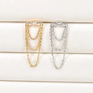 Close-up of S925 silver needle chain tassel earrings with zircon in gold and silver