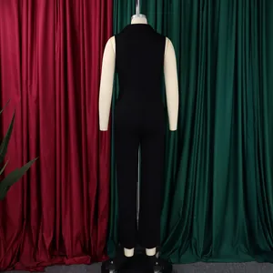 Back view of a sleek black sleeveless jumpsuit featuring a waist-cinching belt design