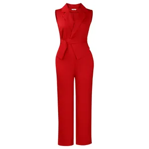 Detail of red sleeveless jumpsuit featuring a notched lapel collar and waist tie belt