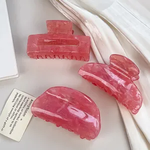 Set di tre mollette per capelli in acrilico rosa marmorizzato con glitter eleganti