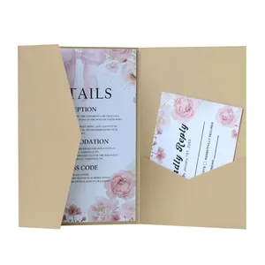 Detail view of champagne gold pocket wedding invitation with floral insert cards