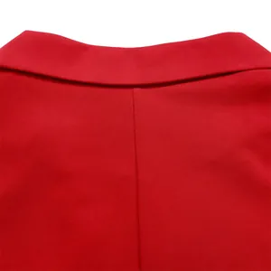 Detailed view of the lapel and stitching on this elegant red sleeveless jumpsuit