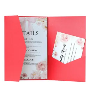 Detail of red wedding invitation pocket with floral motif card and RSVP insert set