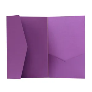 Detail view of the inner dual pockets on a pearlescent purple paper wedding invitation card