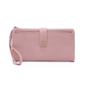 Close-up of pink litchi texture long wallet with card slots and metal buckle