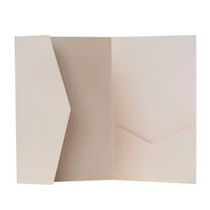 Macro detail of pearlescent pink paper invitation folder with shimmering finish