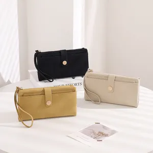 Long PU leather wallet with lychee texture and wrist strap in three elegant colors