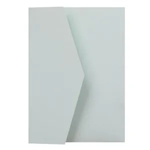 Detail of light blue kraft paper envelope with triangular flap and matte texture