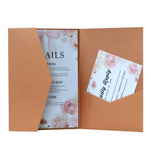 Elegant rose gold laser cut wedding invitation set with floral detail and RSVP card