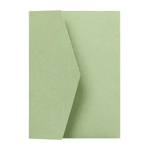 Detail of light green matte paper wedding invitation envelope with modern geometric flap