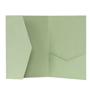 Macro detail of high-quality sage green laser cut invitation card with V-cut inner pocket