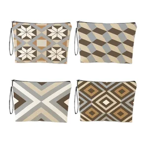 Set di 4 borse da toilette con stampa geometrica in tela e cerniere metalliche