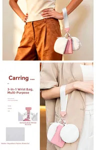 Detailansicht der 3-in-1-Handgelenktasche aus rosa Nylon mit abnehmbaren Metallclips