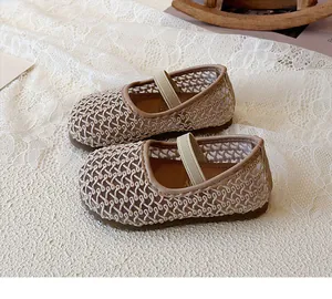 Close-up of children's beige mesh Mary Jane shoes with elastic strap and non-slip sole