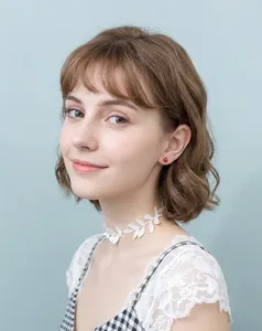 Detailed view of handmade white lace leaf choker with cute red ladybug stud earrings