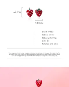 Detailed view of S925 silver strawberry earrings with red enamel and green leaves