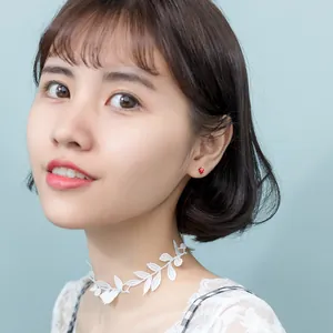 Cute S925 silver red strawberry stud earrings with white dots on female model
