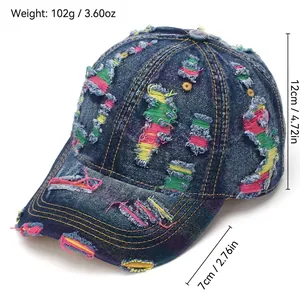 Distressed vintage denim baseball cap with colorful embroidery and ripped details