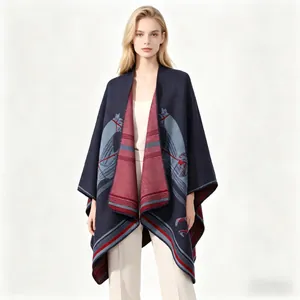 Detail of navy blue equestrian pattern poncho with thick fabric and fine stitching