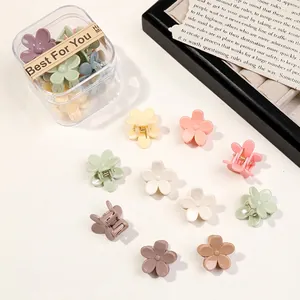 Mini flower hair claws in macaron colors with transparent storage box packaging